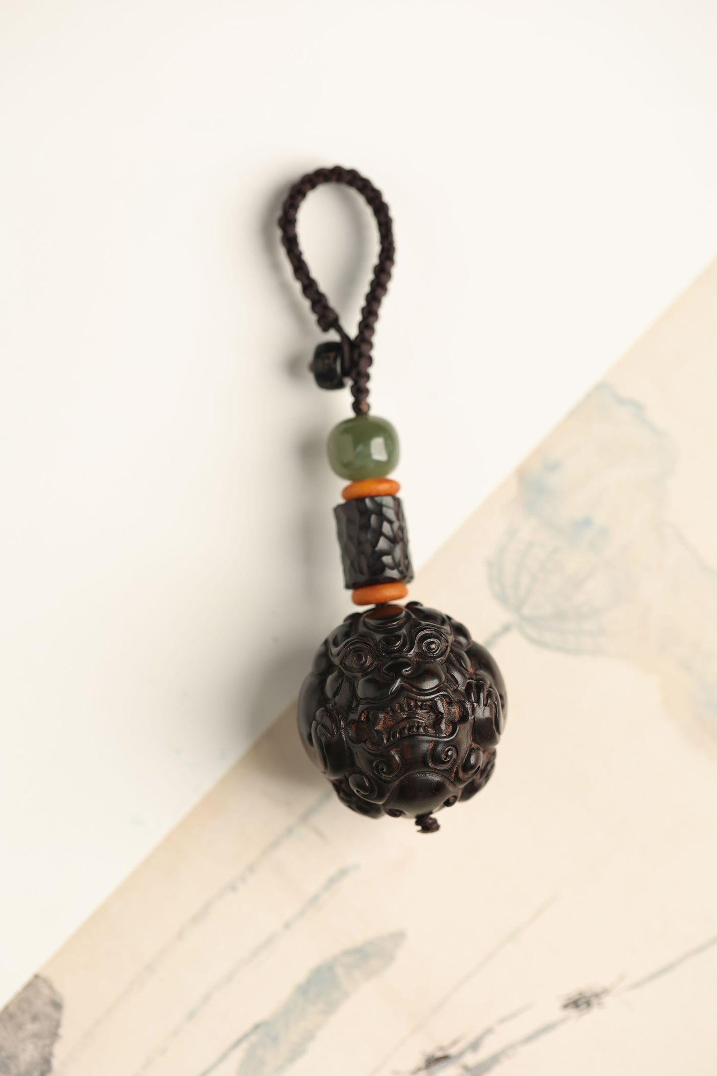 Zen Peace Handcrafted Black Sandalwood Pi Xiu Locket – Harnessing Nature's Powe