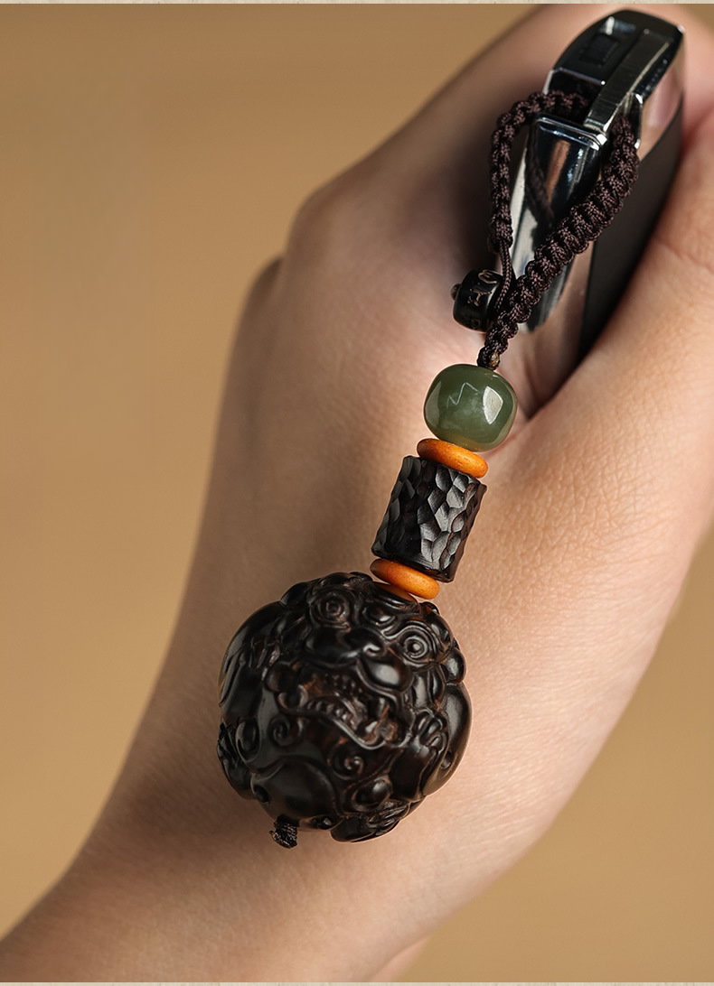 Zen Peace Handcrafted Black Sandalwood Pi Xiu Locket – Harnessing Nature's Powe